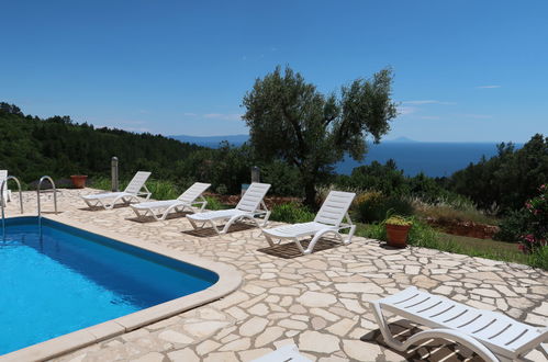 Foto 2 - Appartamento con 3 camere da letto a Labin con piscina e vista mare