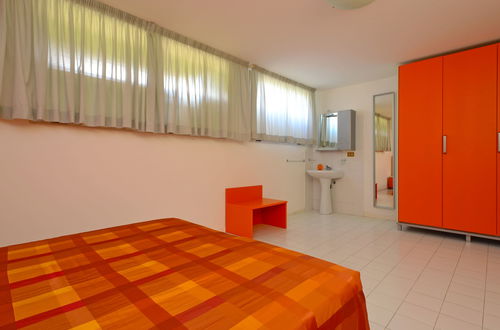 Foto 12 - Appartamento con 1 camera da letto a Lignano Sabbiadoro con piscina e giardino