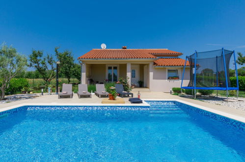 Foto 1 - Casa de 2 habitaciones en Pula con piscina privada y vistas al mar