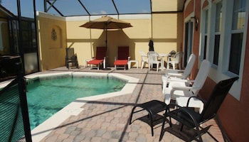 Photo 1 - 4br, 3ba T/home W/ Screened-in Heated Pool 4 Bedroom Townhouse by Redawning