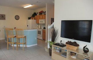 Photo 2 - 4br, 3ba T/home W/ Screened-in Heated Pool 4 Bedroom Townhouse by Redawning