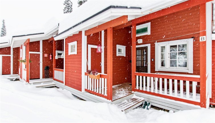 Foto 1 - Casa de 1 habitación en Puolanka con sauna y vistas a la montaña