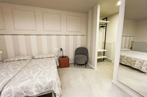 Foto 23 - Casa con 3 camere da letto a Lignano Sabbiadoro con piscina e giardino