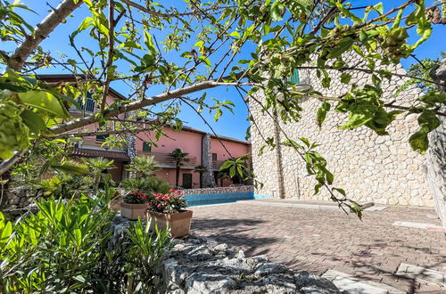 Foto 41 - Casa con 3 camere da letto a Lignano Sabbiadoro con piscina e giardino