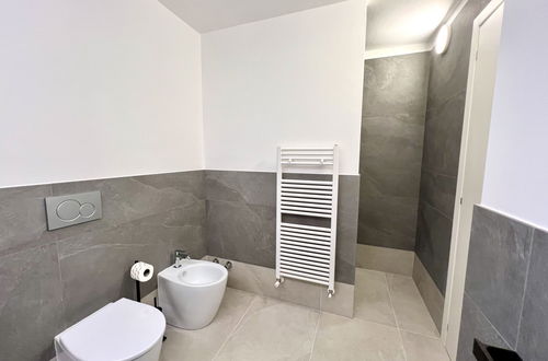Foto 26 - Casa con 3 camere da letto a Lignano Sabbiadoro con piscina e giardino