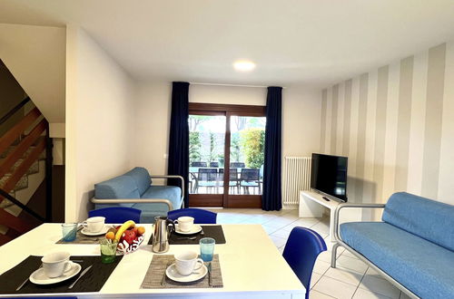 Foto 8 - Casa con 3 camere da letto a Lignano Sabbiadoro con piscina e giardino