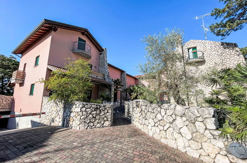 Foto 43 - Casa con 3 camere da letto a Lignano Sabbiadoro con piscina e giardino