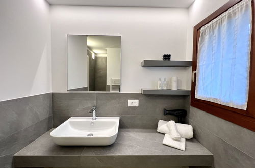 Foto 25 - Casa con 3 camere da letto a Lignano Sabbiadoro con piscina e giardino