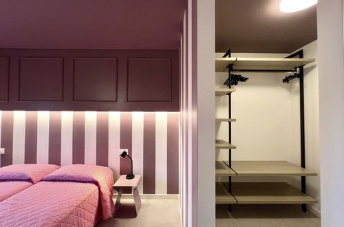 Foto 17 - Casa con 3 camere da letto a Lignano Sabbiadoro con piscina e giardino