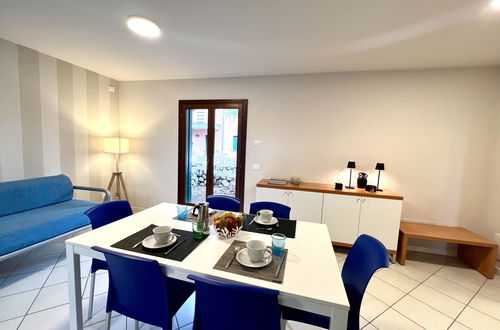 Foto 10 - Casa con 3 camere da letto a Lignano Sabbiadoro con piscina e giardino