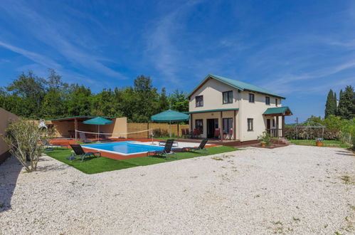 Foto 32 - Casa con 4 camere da letto a Umag con piscina privata e giardino