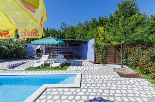 Foto 12 - Casa de 4 quartos em Umag com piscina privada e jardim