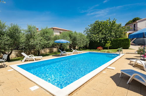 Photo 34 - Maison de 3 chambres à Sveti Lovreč avec piscine privée et vues à la mer