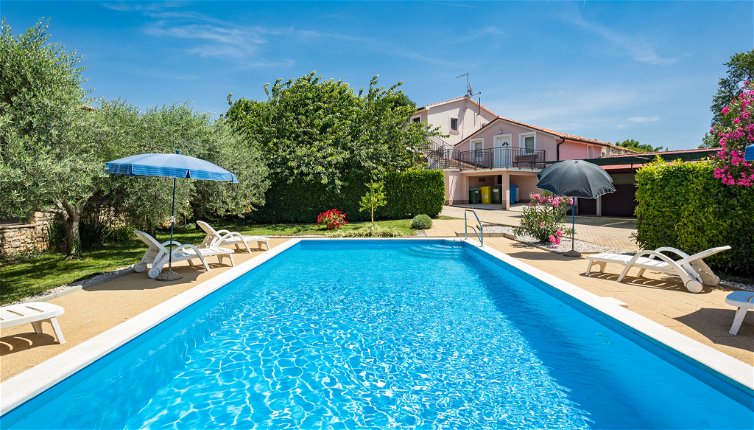 Foto 1 - Casa de 3 habitaciones en Sveti Lovreč con piscina privada y vistas al mar