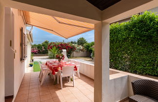 Photo 3 - Maison de 3 chambres à Santa-Lucia-di-Moriani avec terrasse et vues à la mer