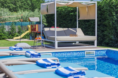 Photo 31 - Maison de 4 chambres à Kaštelir-Labinci avec piscine privée et vues à la mer