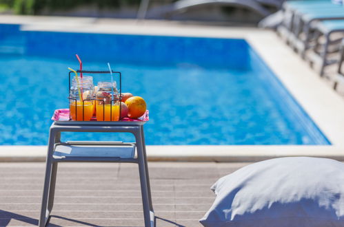 Photo 27 - Maison de 4 chambres à Kaštelir-Labinci avec piscine privée et vues à la mer