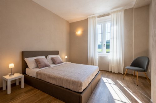 Foto 13 - Apartment mit 1 Schlafzimmer in Calosso mit schwimmbad und garten