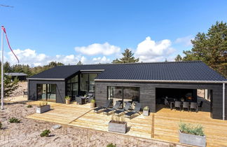 Photo 1 - Maison de 4 chambres à Vejers Strand avec terrasse et bain à remous