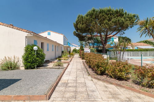 Foto 1 - Appartamento con 2 camere da letto a Saint-Palais-sur-Mer con piscina e giardino