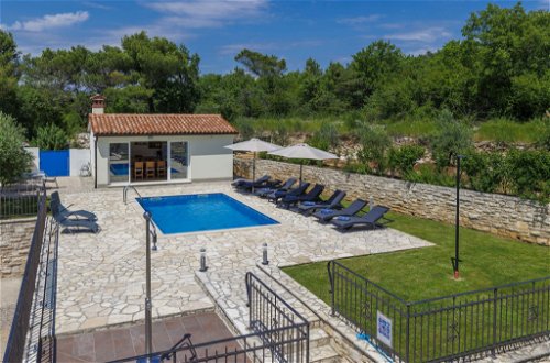 Foto 4 - Casa de 4 habitaciones en Raša con piscina privada y vistas al mar