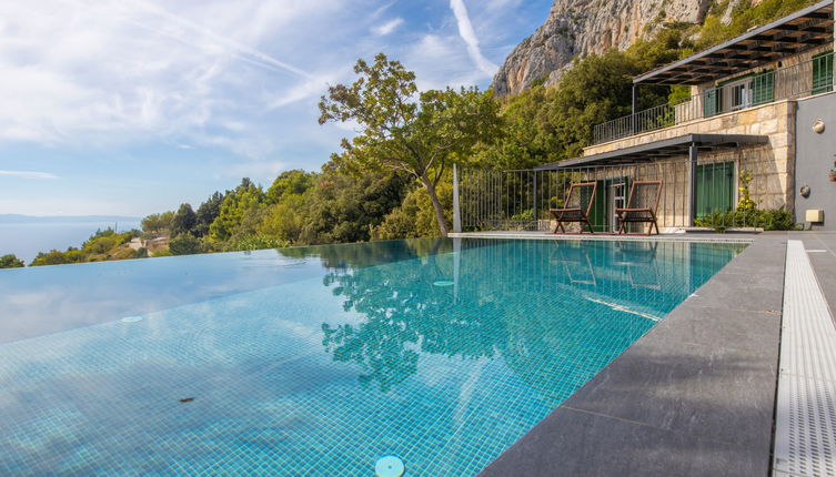 Photo 1 - Maison de 3 chambres à Makarska avec piscine privée et vues à la mer