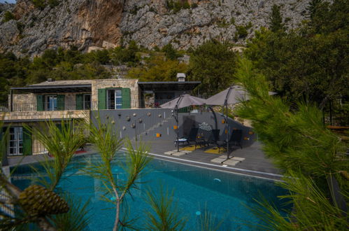 Foto 30 - Casa con 3 camere da letto a Makarska con piscina privata e giardino