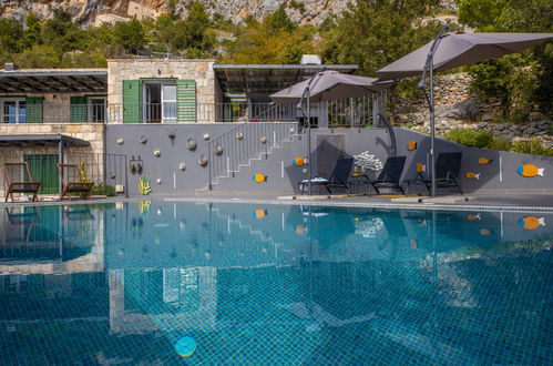 Foto 2 - Casa con 3 camere da letto a Makarska con piscina privata e vista mare