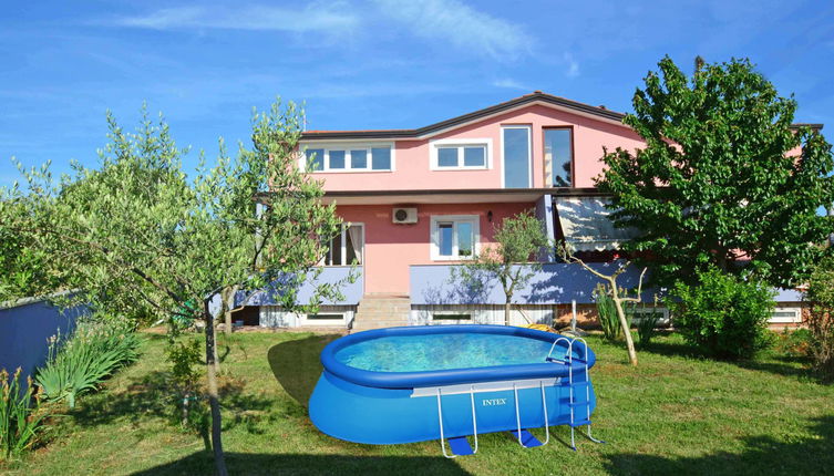 Photo 1 - Maison de 2 chambres à Umag avec piscine privée et vues à la mer