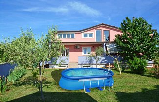 Foto 1 - Casa de 2 habitaciones en Umag con piscina privada y vistas al mar
