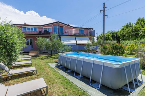 Foto 1 - Casa con 2 camere da letto a Umag con piscina privata e giardino