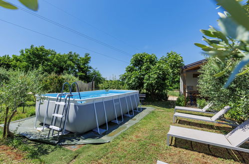 Foto 16 - Casa de 2 habitaciones en Umag con piscina privada y jardín