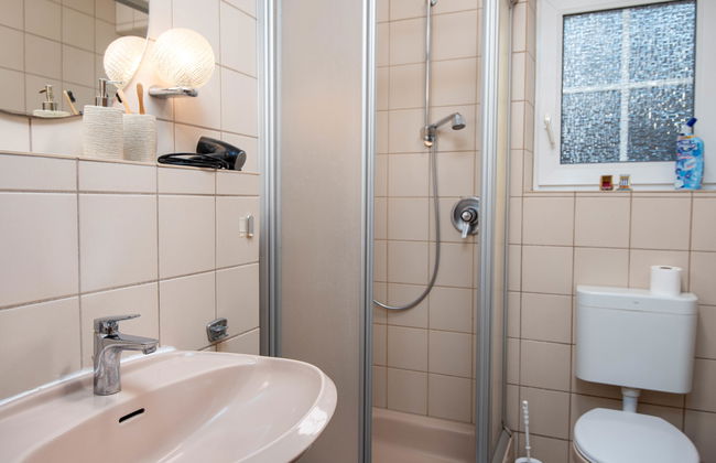 Apartment mit 2 Schlafzimmern in Norden mit garten und terrasse - Foto 16