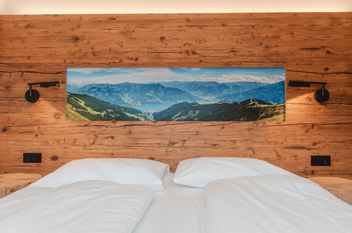 Foto 4 - Appartamento con 2 camere da letto a Bruck an der Großglocknerstraße con terrazza e vista sulle montagne