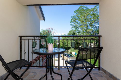 Photo 8 - Maison de 2 chambres à Dobrinj avec piscine privée et vues à la mer