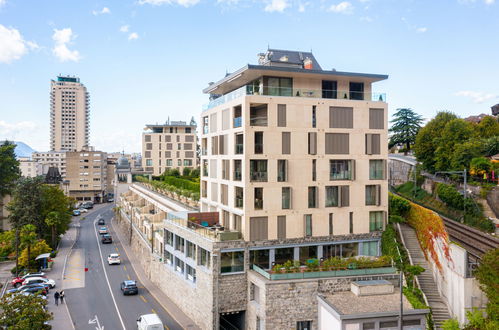 Foto 1 - Apartamento de 2 habitaciones en Montreux con piscina y vistas a la montaña