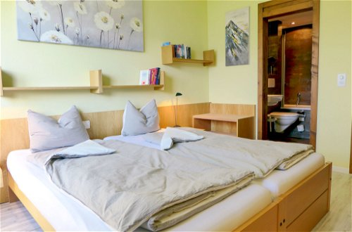 Foto 15 - Apartment mit 3 Schlafzimmern in Beatenberg mit schwimmbad und blick auf die berge