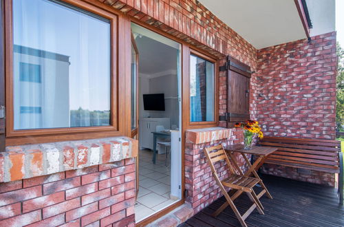 Foto 18 - Apartamento de 1 quarto em Mielno com jardim e terraço