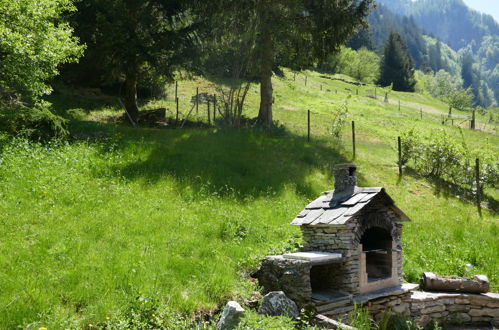 Photo 8 - Maison de 1 chambre à Serravalle avec jardin et vues sur la montagne