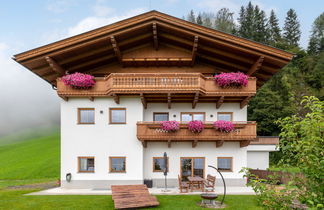 Foto 2 - Appartamento con 3 camere da letto a Ramsau im Zillertal con giardino e sauna