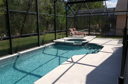 Photo 19 - Escape To A 4br, 3ba W/recreation Room 4 Bedroom Villa by RedAwning