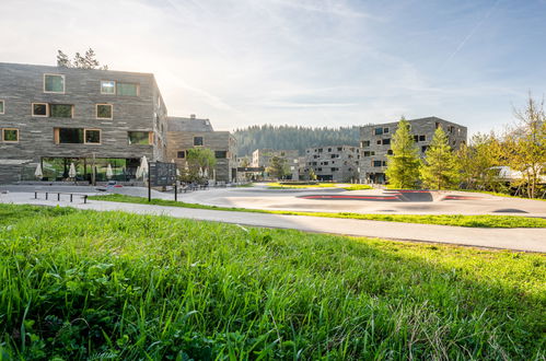 Foto 1 - Apartamento de 4 habitaciones en Laax con vistas a la montaña