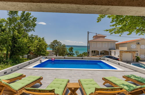 Foto 1 - Apartamento de 1 habitación en Jasenice con piscina y vistas al mar
