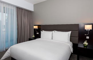 Foto 7 - Flora Creek Deluxe Hotel Apartments