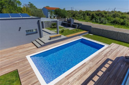 Photo 8 - Maison de 4 chambres à Pula avec piscine privée et vues à la mer