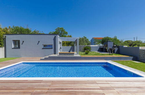 Foto 7 - Casa de 4 habitaciones en Pula con piscina privada y vistas al mar
