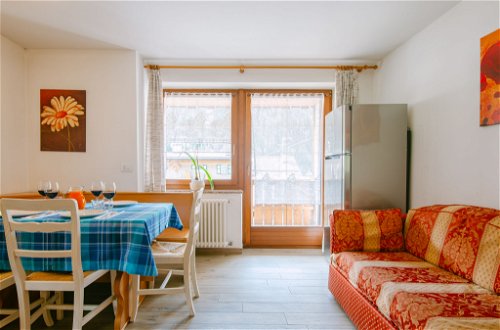 Foto 7 - Appartamento con 2 camere da letto a Canazei con giardino e vista sulle montagne