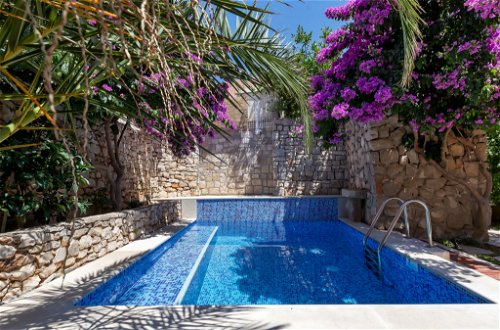 Foto 47 - Casa con 2 camere da letto a Sutivan con piscina privata e vista mare