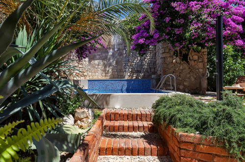 Foto 5 - Casa de 2 quartos em Sutivan com piscina privada e jardim