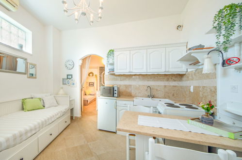 Foto 4 - Appartamento con 1 camera da letto a Lovran con piscina e vista mare